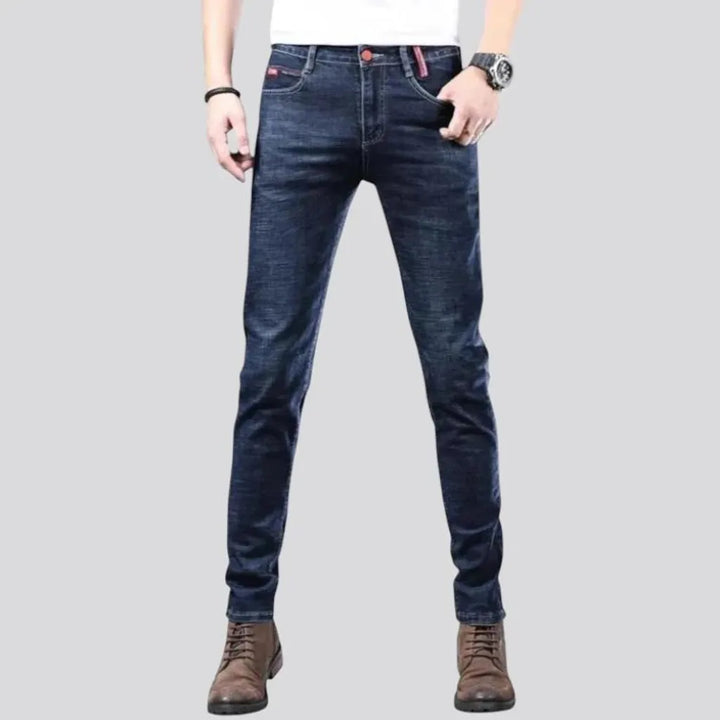 Fitted mid rise elastic men's jeans