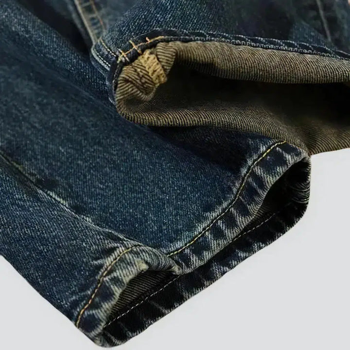 Yellow-cast medium-wash jeans
 for men