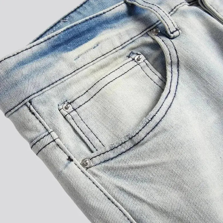 Skull-embroidery mid-waist jeans
 for men