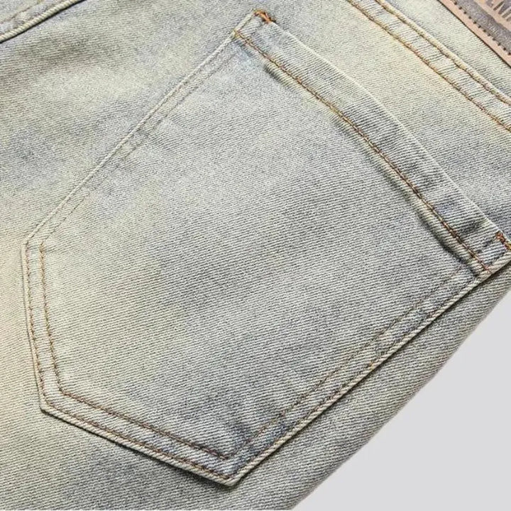 Embroidered mid-waist jeans
 for men