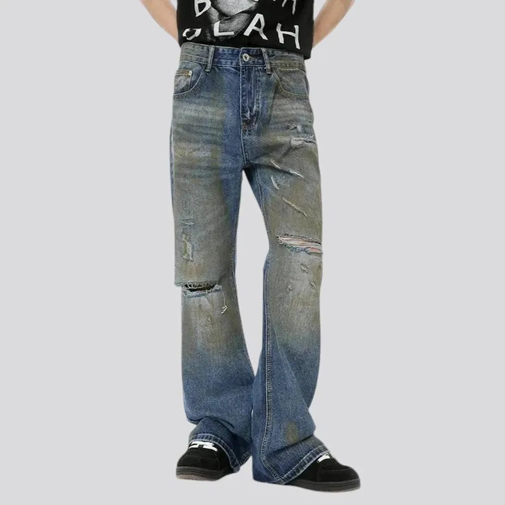 Distressed loose fit men's jeans