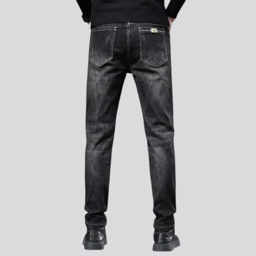 Elastic dark padded jeans for men