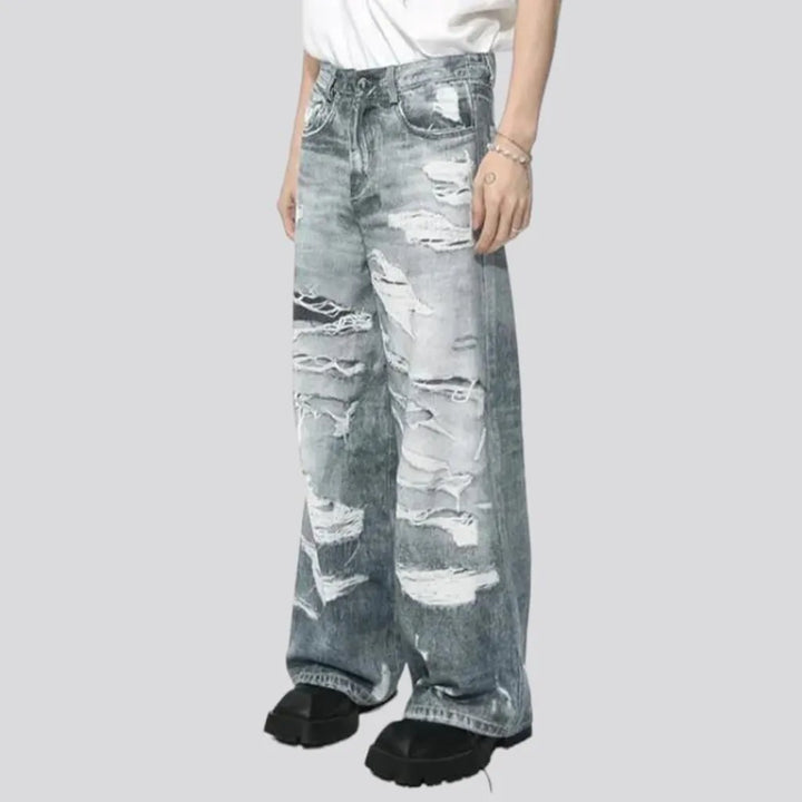 Floor-length men's distressed jeans