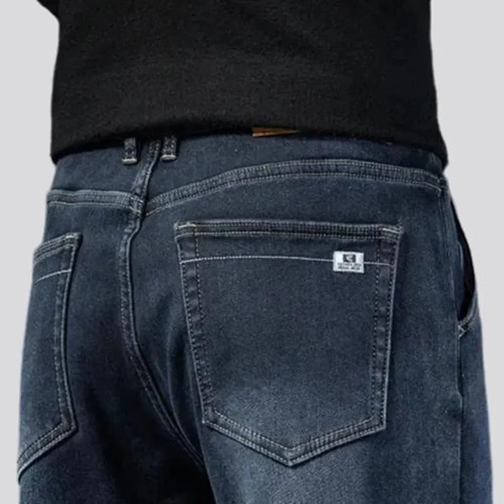 Abraded casual insulated men's jeans