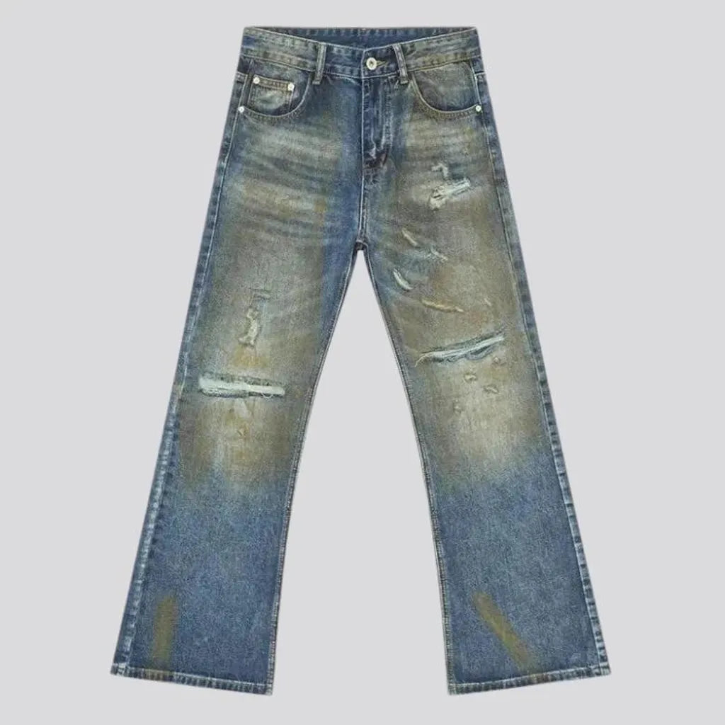 Distressed loose fit men's jeans