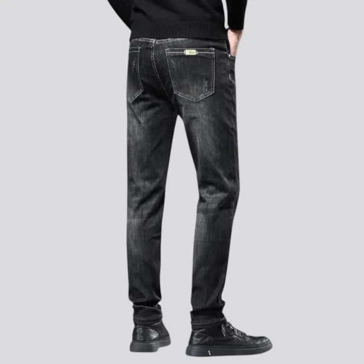 Elastic dark padded jeans for men