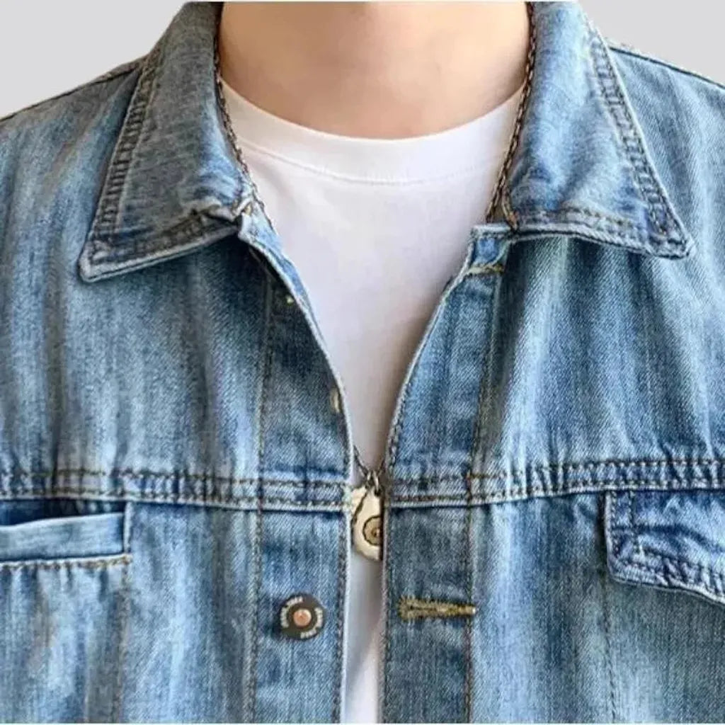 Light-wash distressed jeans jacket