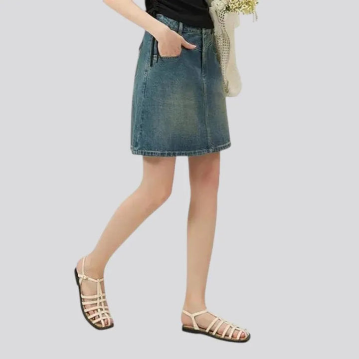 Micro length stylish stonewashed denim skirt