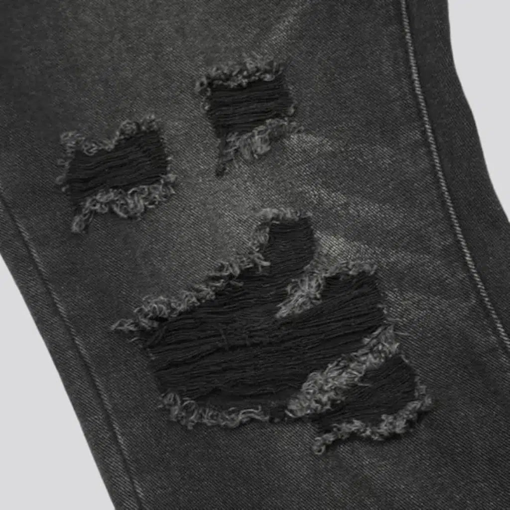 Distressed men's bootcut jeans