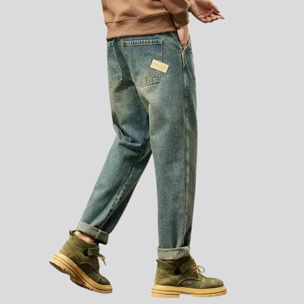 Vintage style roomy faded men's jeans