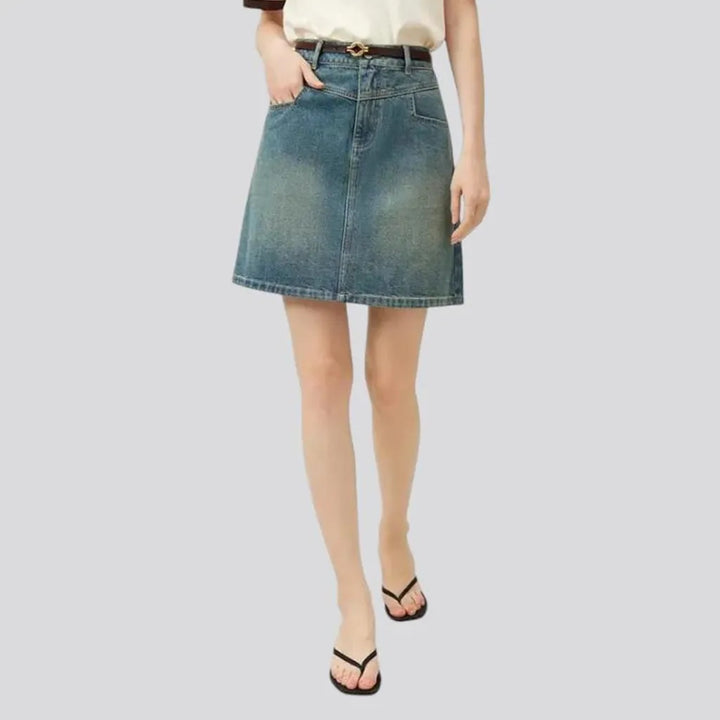 Micro length stylish stonewashed denim skirt