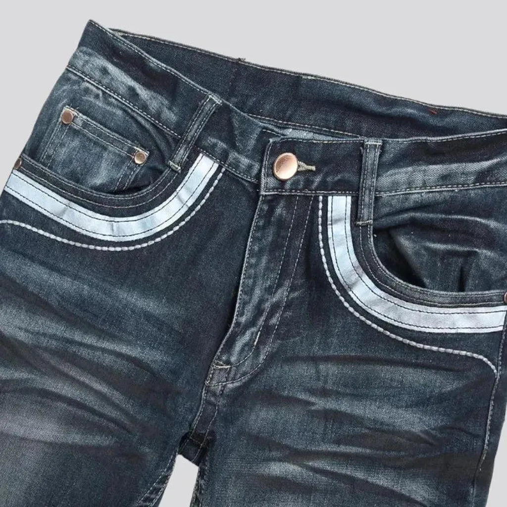 Creased men's intense-dye jeans