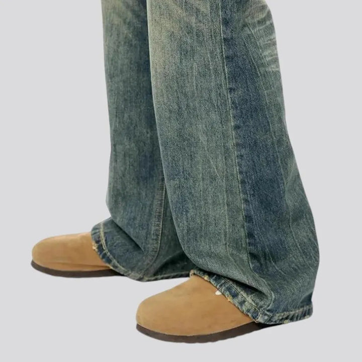 Baggy over dyed whiskered jeans for men