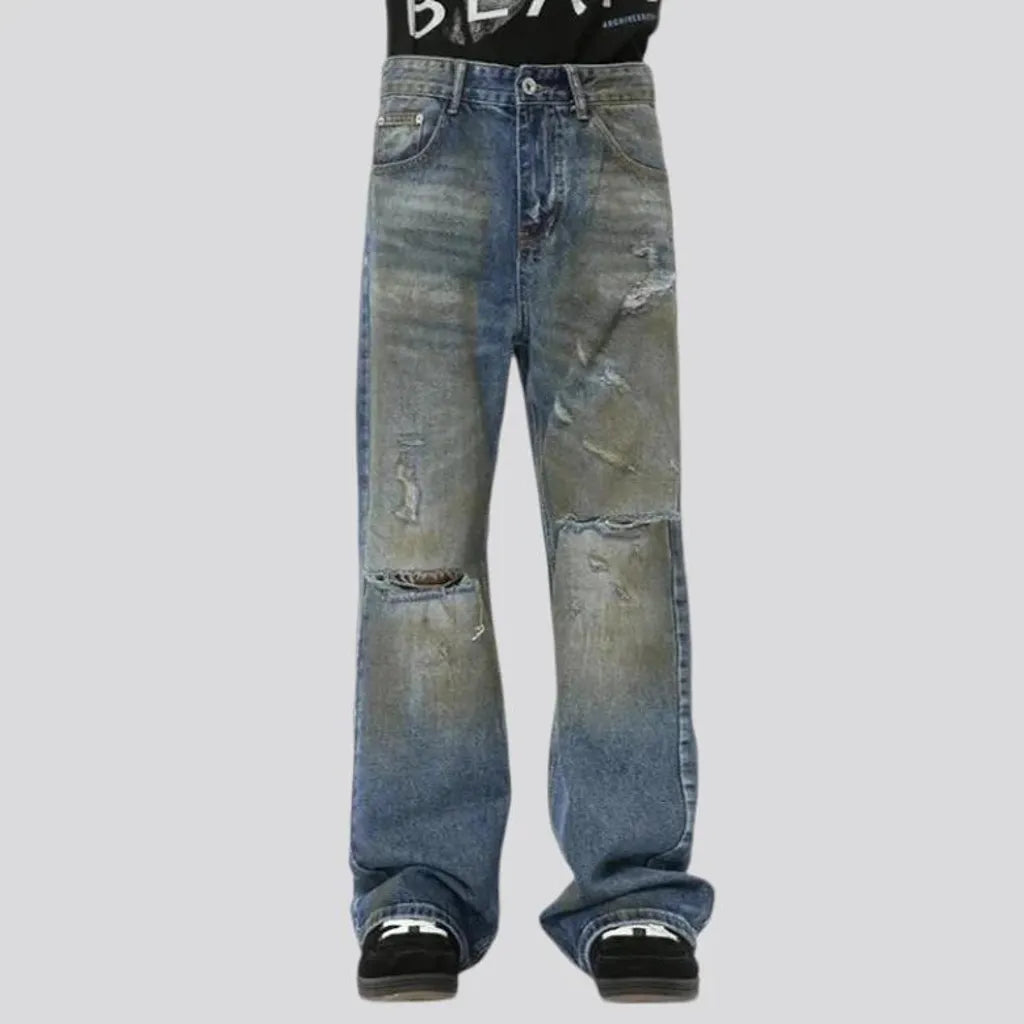 Distressed loose fit men's jeans