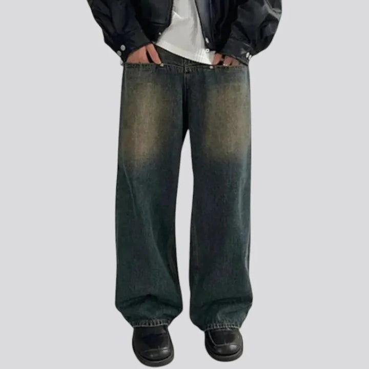 Dark mid rise 90s style men's jeans