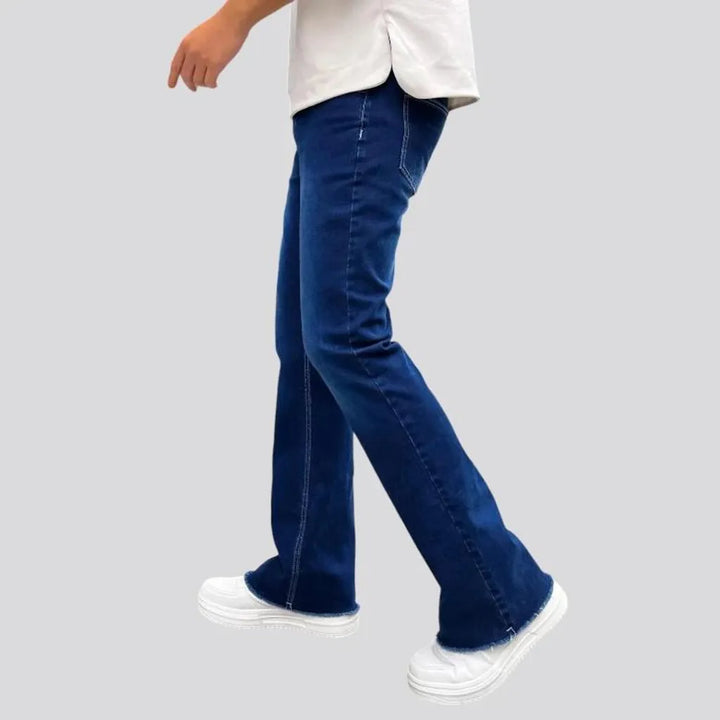 Mid rise sanded men's jeans