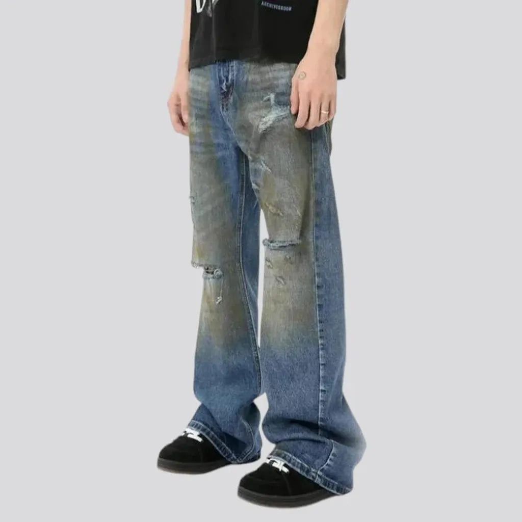 Distressed loose fit men's jeans