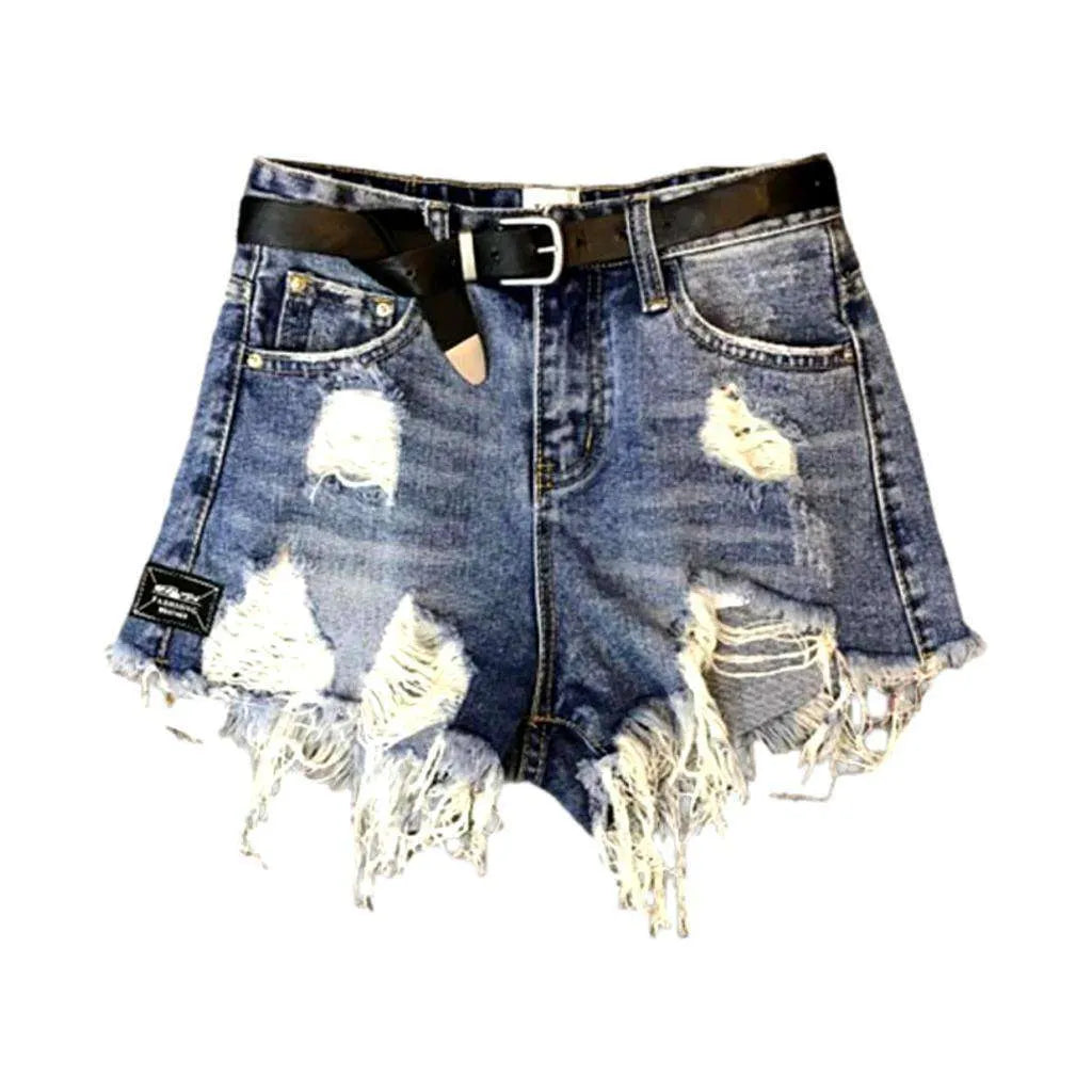 Grunge-style distressed denim shorts