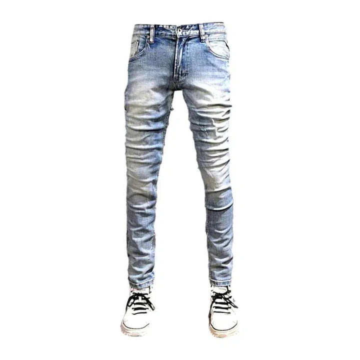 Slightly torn men's fabric jeans