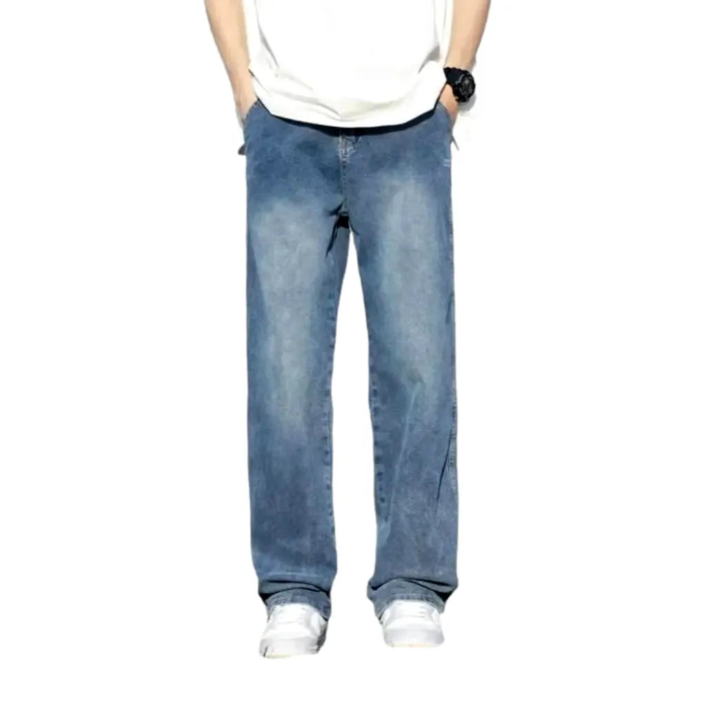 Stonewashed men's floor-length jeans